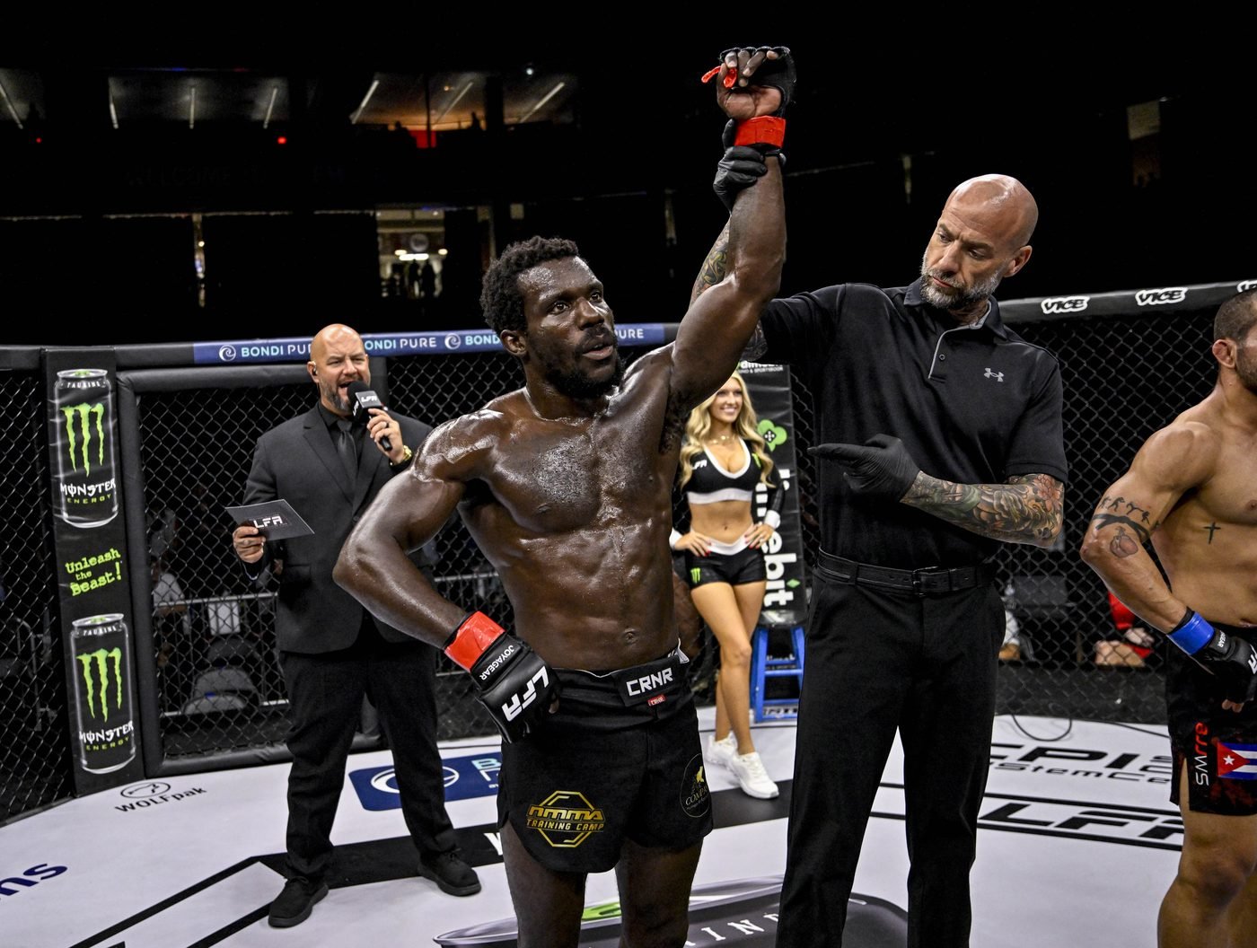 Nashville MMA Training Camp fighter getting his hand raised after a win